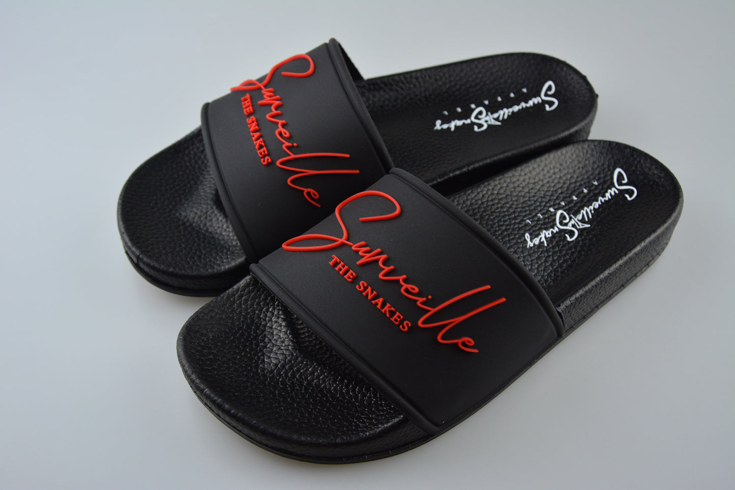 "Surveille" Signature Slides